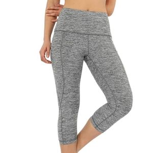 ODODOS Women's High Waist Yoga Capris with Pockets